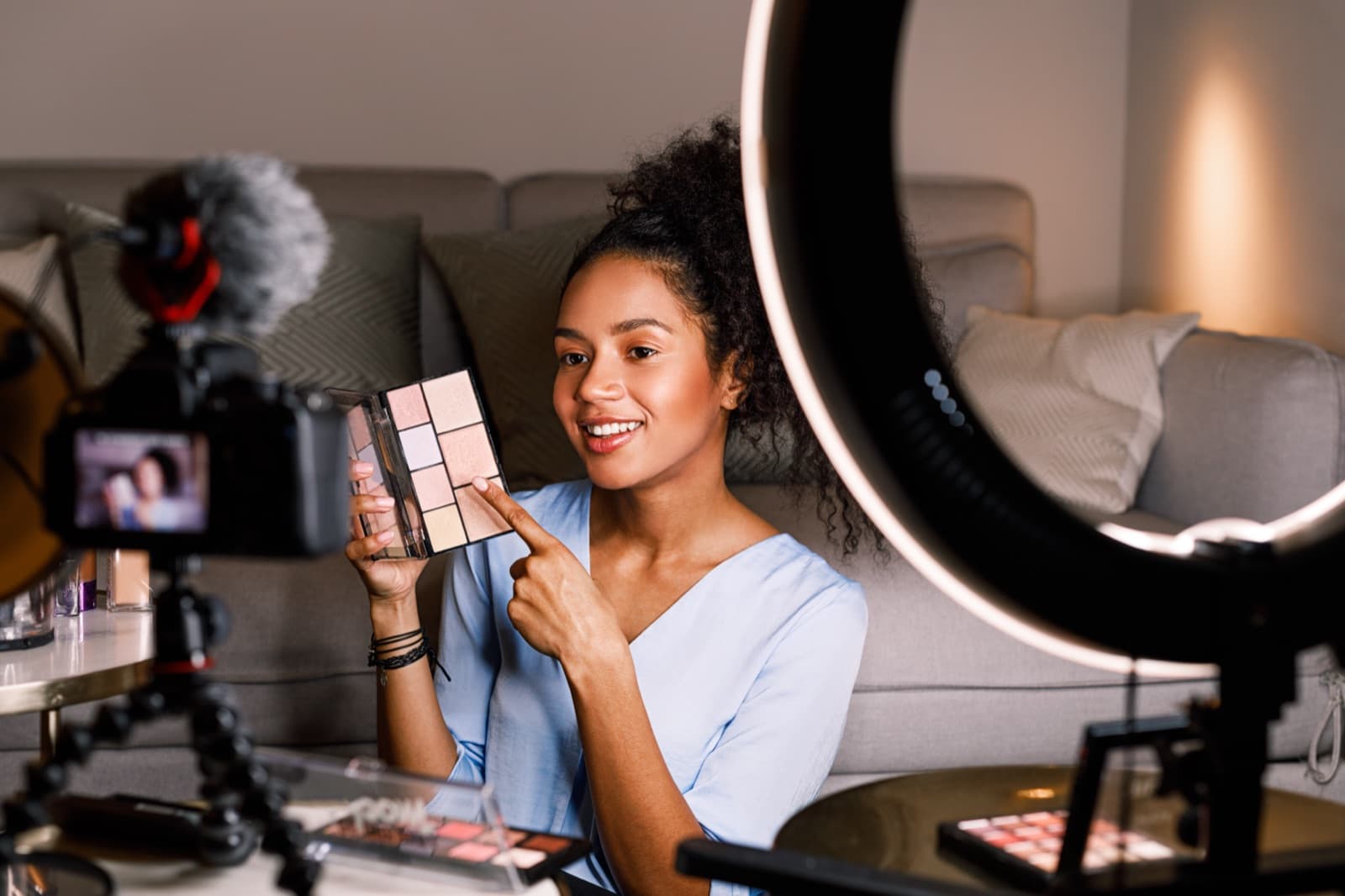 Beauty content creator filming a product review for a campaign